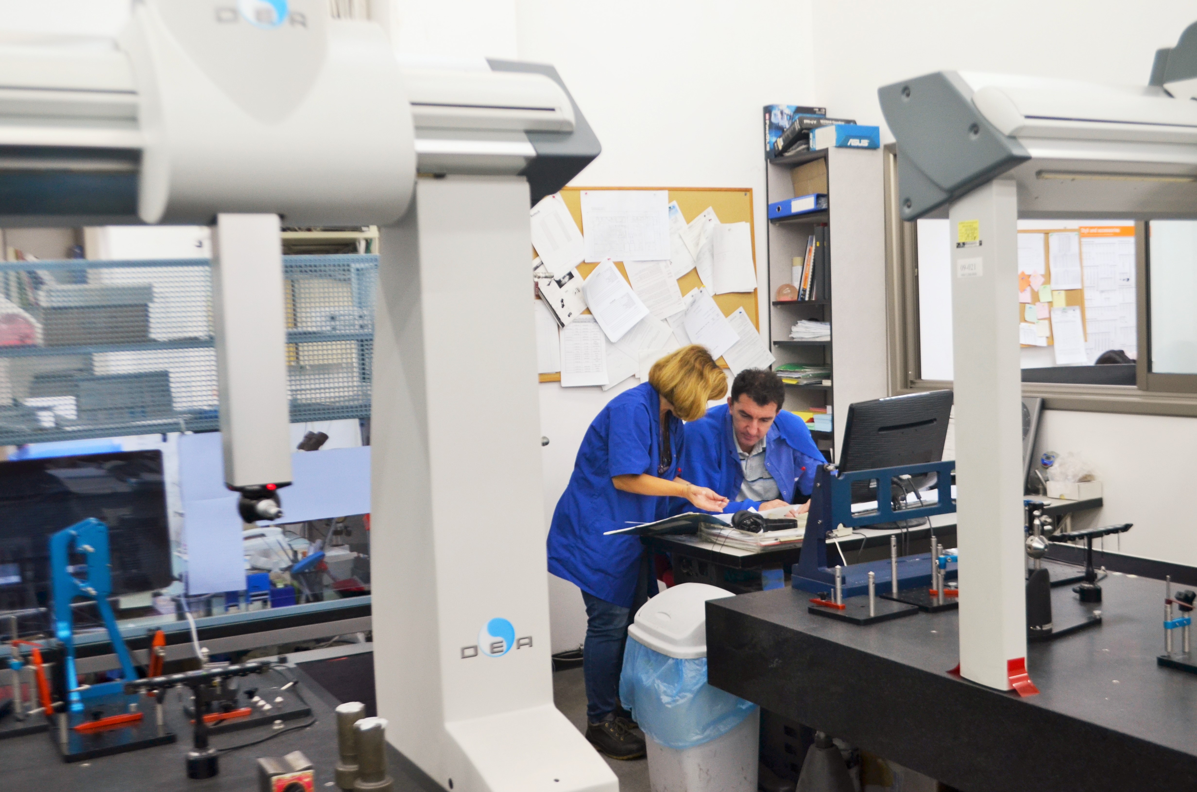 Flow Industries engineer assembling a high-pressure impulse system